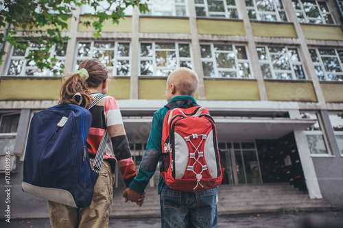 Boy and Girl Going to School