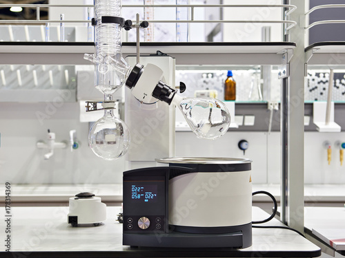 Laboratory rotary evaporator with chemical preparation in flask