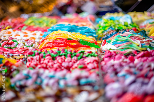 Tableau sur toile Colorful marmalade and candy are on the counter