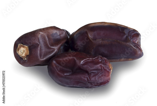 Pile of sweet saudi khudri dates on white background photo