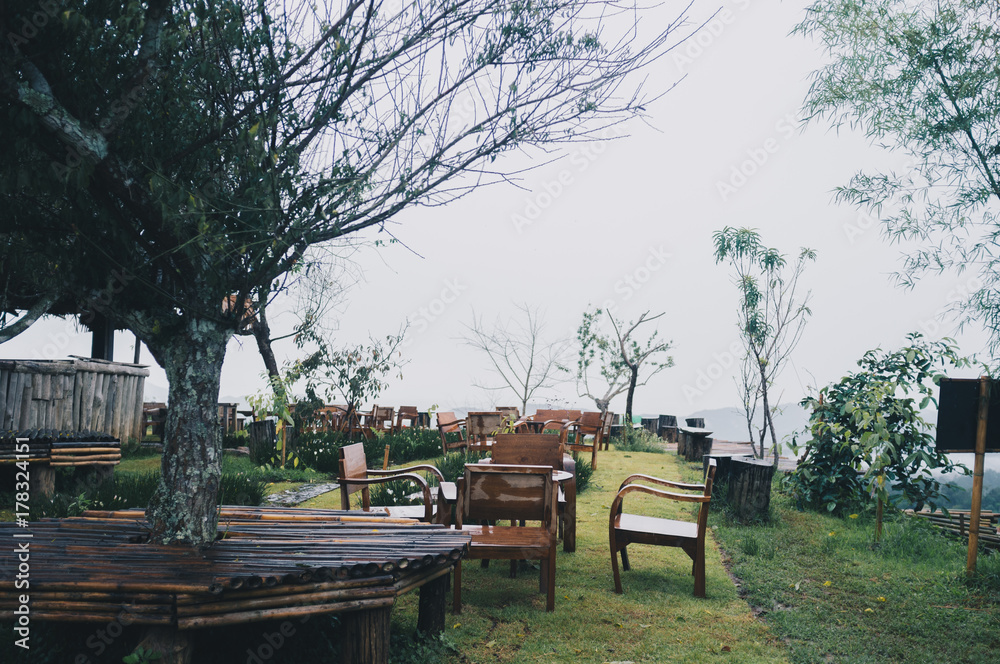 Obraz premium The terrace in forest on rainy day. Outdoor barbecue place and pavilion with natural view in mountain.