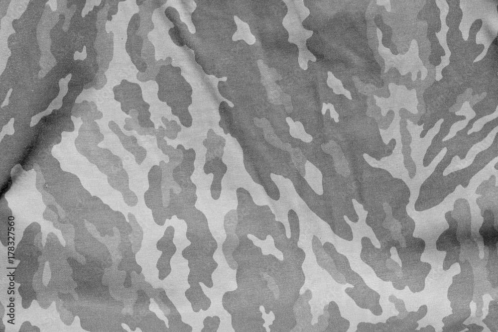 Black and white military camouflage uniform pattern.
