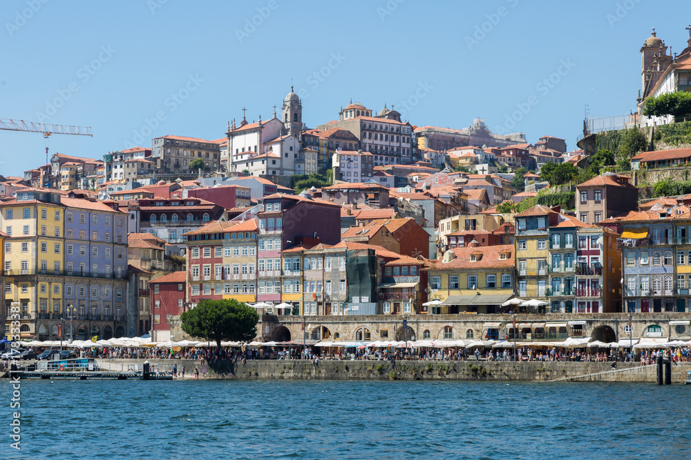 Colorful Facades of Typical Houses on the Bank of the River Dour