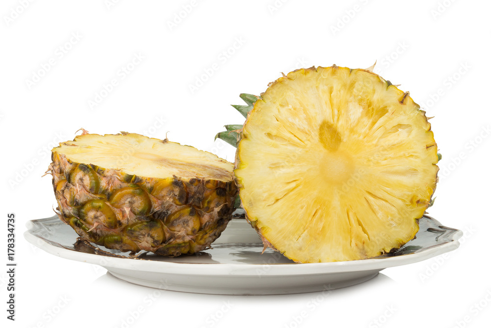 pineapple on dish half isolated on white background pineapple on dish half isolated on white background