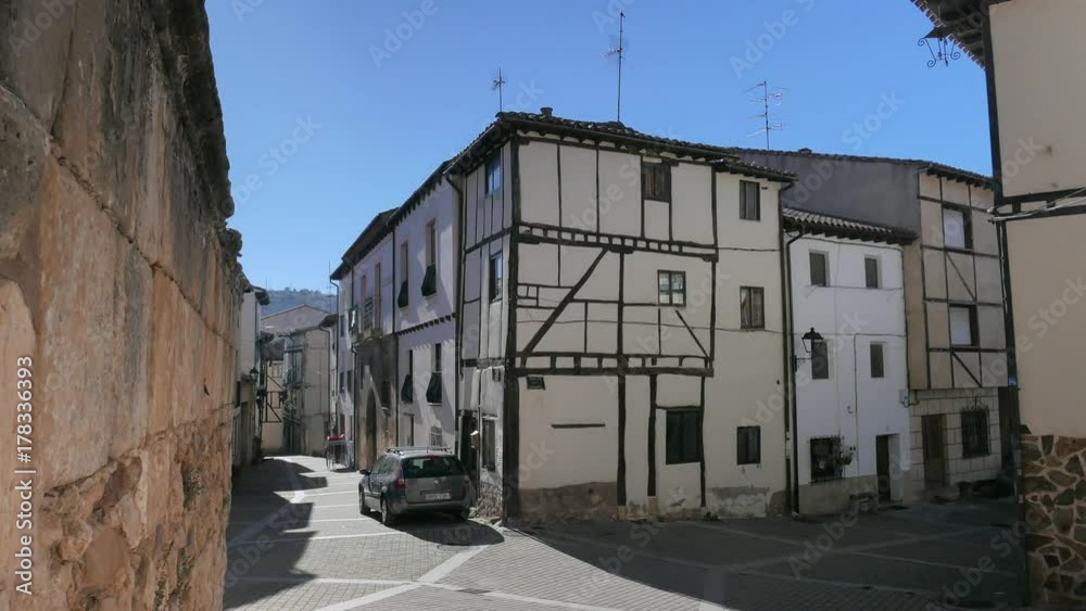 Old medieval street in the ancient medieval village of Covarrubias, Burgos, Spain. Old medieval street in the ancient medieval village of Covarrubias, Burgos, Spain.
