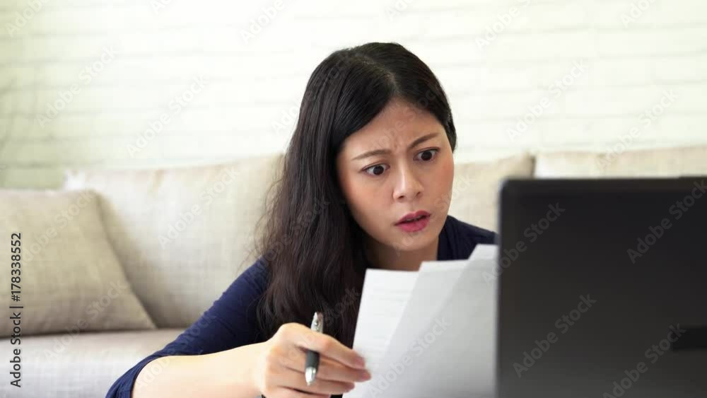 stressed worried young woman doing banking stressed worried young woman doing banking