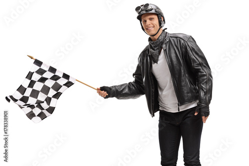 Biker waving a checkered race flag