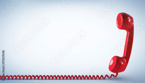Photos Telefonhörer mit Kabel am Boden rot
