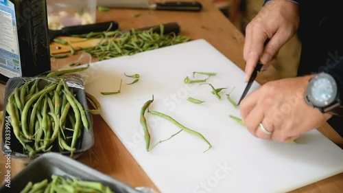 Wallpaper Mural Cook cuts bean pods close up Torontodigital.ca