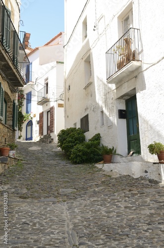 Cobblestone alley slope in Cadaques  Girona  Spain.