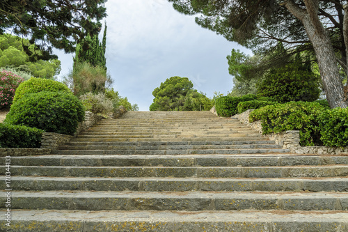 stairs of the Greek and Roman ruins of the archaeological place of Ampurias, on the brave coast in Spain. photo