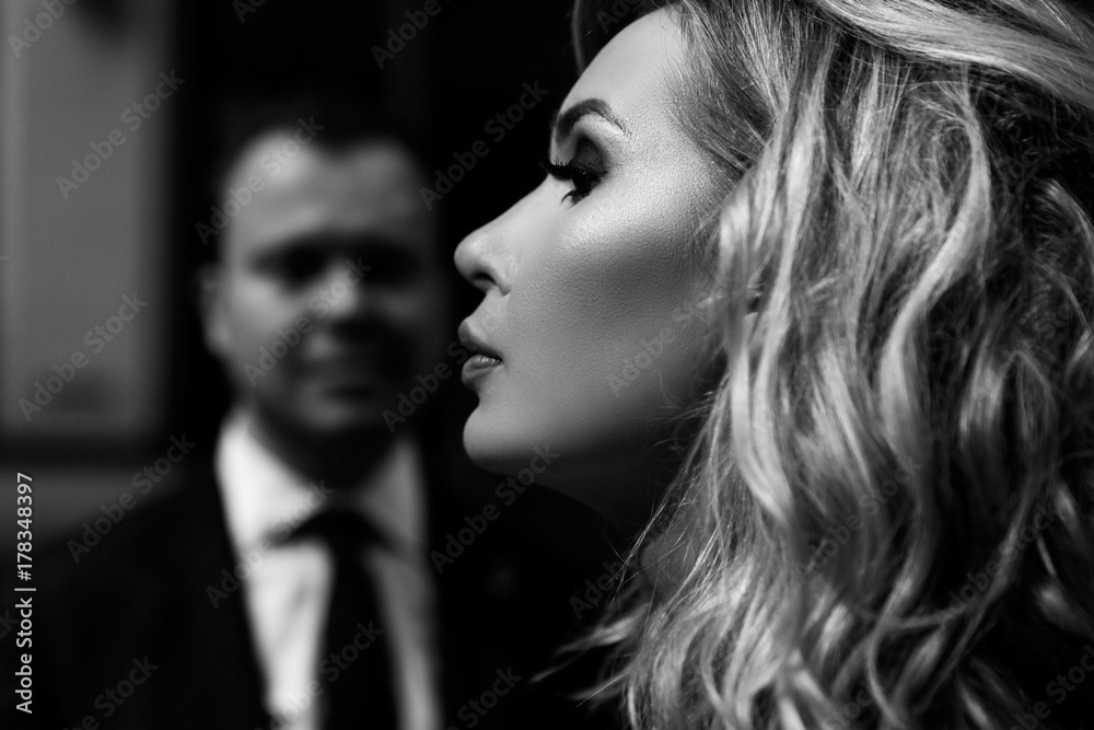 Profile of stunning woman before man's face 스톡 사진 Adobe Stock