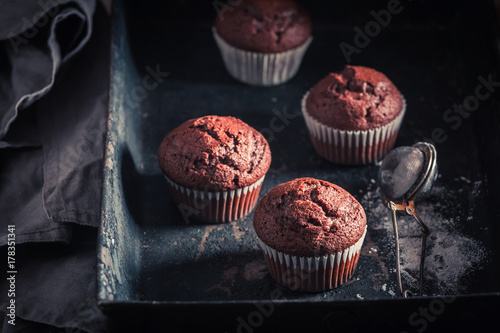 Tasty and sweet chocolate muffin with caster sugar