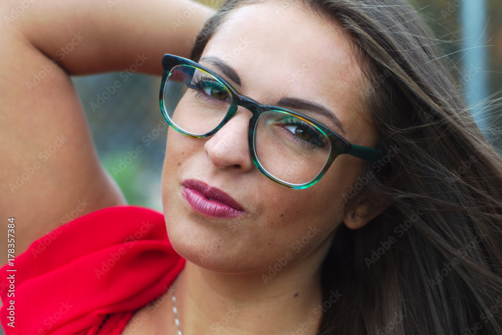 young women portrait close-up glasses red dress young women portrait close-up glasses red dress