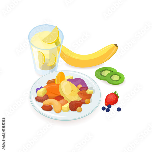Delicious healthy breakfast consisted of nuts and sliced fresh and dried frui...