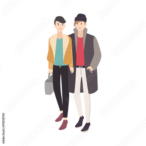 Pair of young men dressed in trendy outerwear smiling, walking together and embracing. Stylish gay couple. Cute cartoon characters isolated on white background. Colorful flat vector illustration.