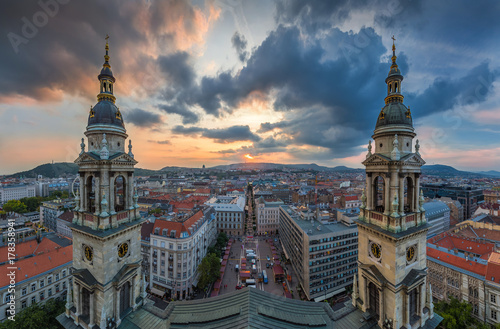 Budapest, Hungary - Panoramic skyline view of Budapest from the top of Saint Stephens Basilica aka Szent Istvan Bazilika at sunset with amazing sky and clouds