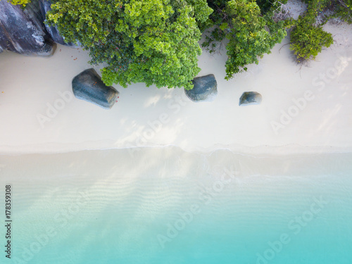 Aerial view or top view of beautiful beach with emerald water