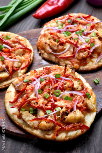 Pizza with chicken meat and vegetables