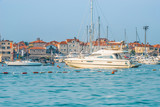  Marina for sailing yachts and boats overlooking the old town off the coast of Budva, Budva Riviera, Montenegro.