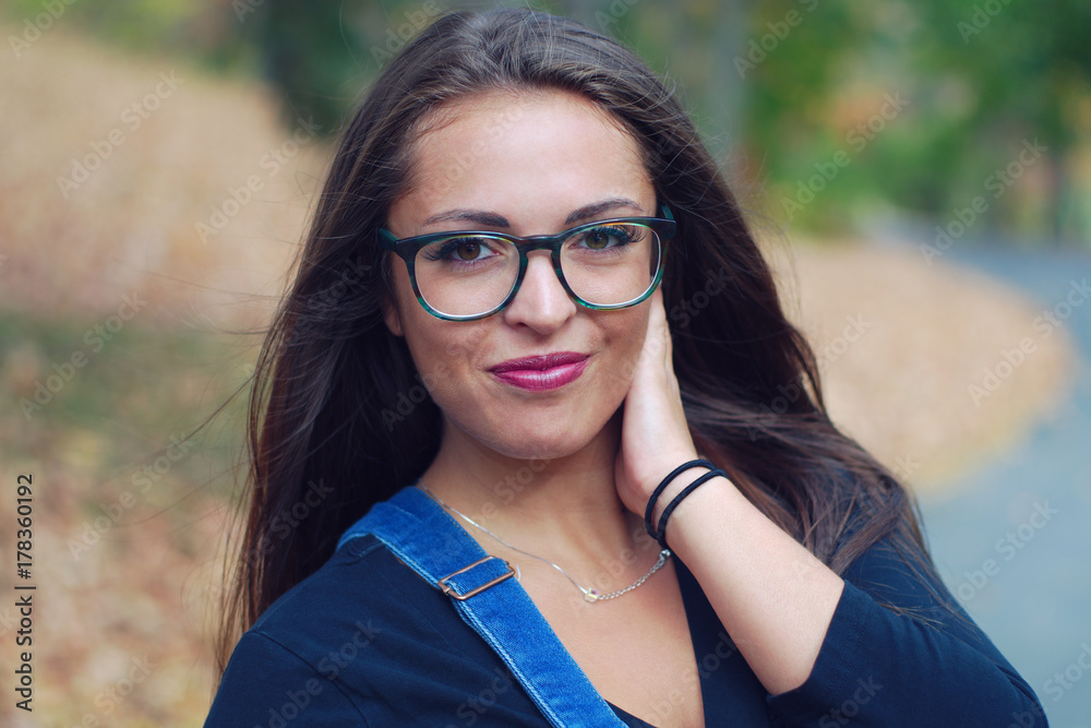 young beautiful women outside in a park portrait young beautiful women outside in a park portrait