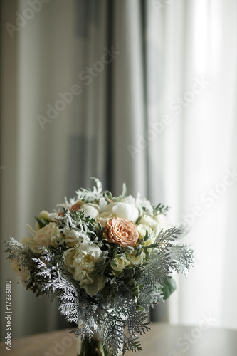 Wedding bouquet stands on the table in bright room © nastasenko