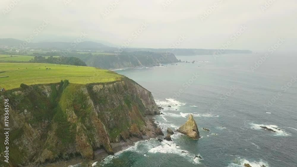 drone flies over the ocean and rocks drone flies over the ocean and rocks