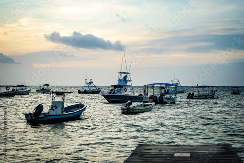 Boats in Anchored Ocean Harbor at Sunrise Mexico