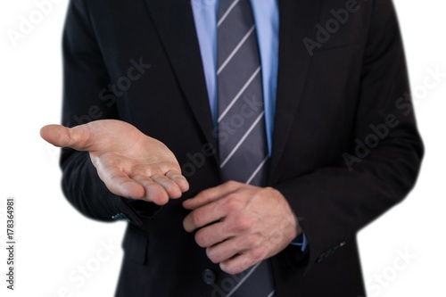 Mid section of businessman advertising invisible product