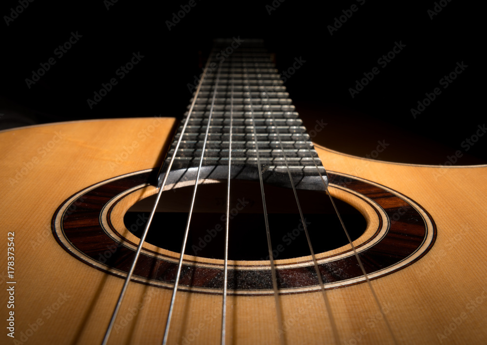 Closeup of a classical guitar low key Closeup of a classical guitar low key