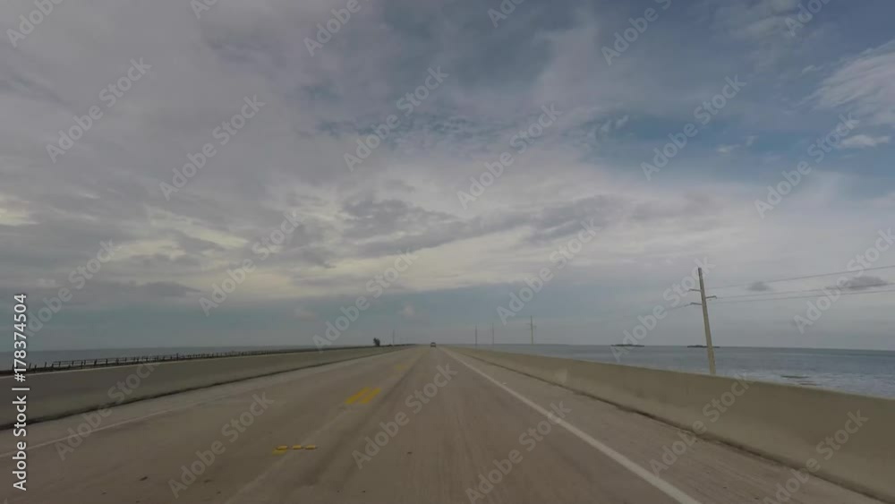 Driving across Florida Keys bridges, among which the 7 mile bridge. Time lapse. Driving across Florida Keys bridges, among which the 7 mile bridge. Time lapse.