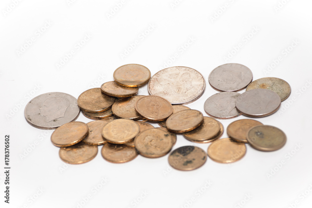 Various coins of American currency isolated against a white background. Various coins of American currency isolated against a white background.