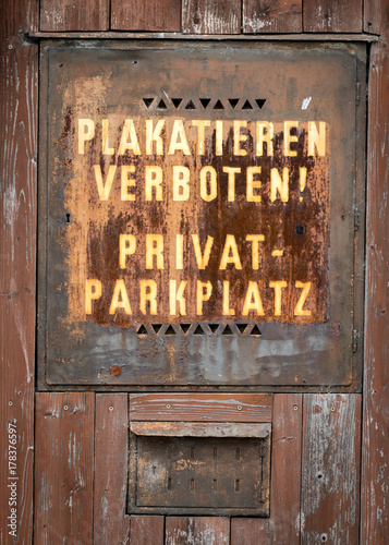 Old rusty sign for private parking space