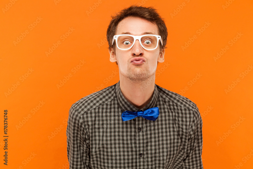 Obraz premium Portrait romantic man, send kiss at camera .Showing lips.