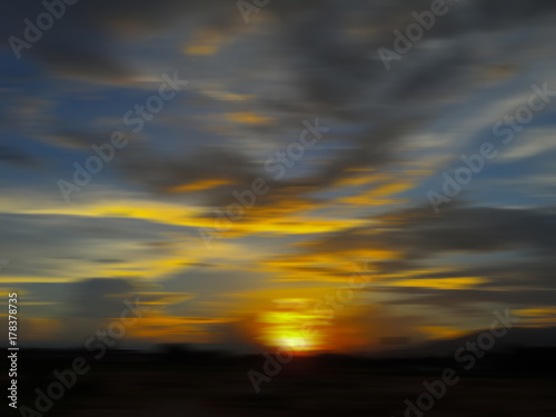 speed blur  nature sunset with blue sky and white cloud on the road