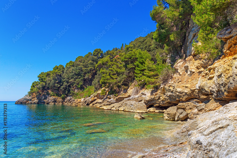 Beautiful view from the sea on beach of Italy, Ligurian coast of Italy in province of La Spezia. Sea landscape.