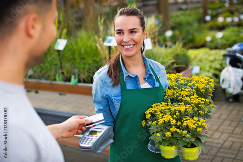 Paying with credit card at garden center

