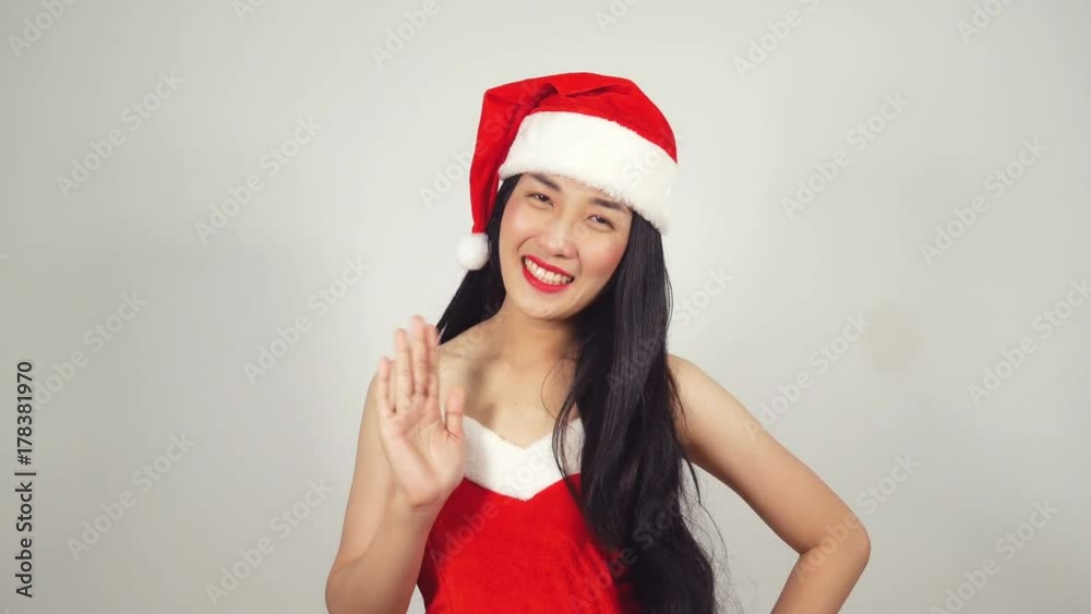 Sexy Girl in Santa Claus Costume for Christmas. Pretty happy girl in santa claus helper hat Sexy Girl in Santa Claus Costume for Christmas. Pretty happy girl in santa claus helper hat