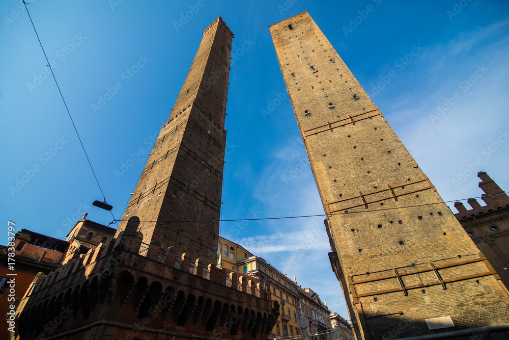 BOLOGNA, ITALY - October, 2017: Two famous falling towers Asinelli and Garisenda in the morning, Bologna, Emilia-Romagna, Italy