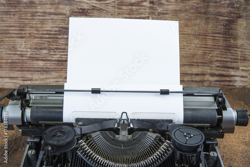 Old typewriter from seventies with paper and copy space. © OttoPles