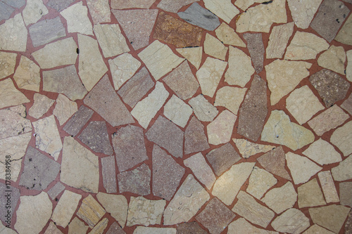 Stone wall texture on the street wall. Texture.