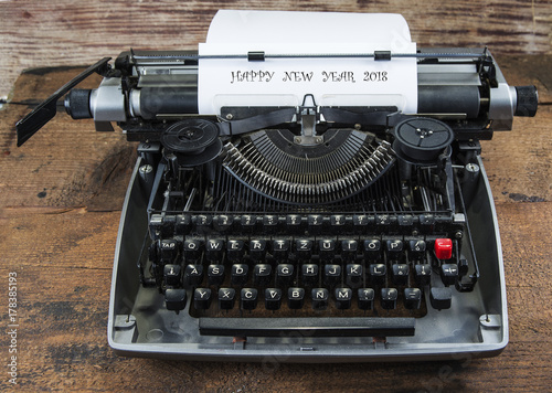 Old typewriter from seventies with paper and copy space.Happy new year 2018.