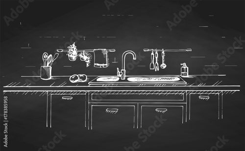 Kitchen sink. Kitchen worktop with sink and drawn on a chalkboard.. The sketch of the kitchen