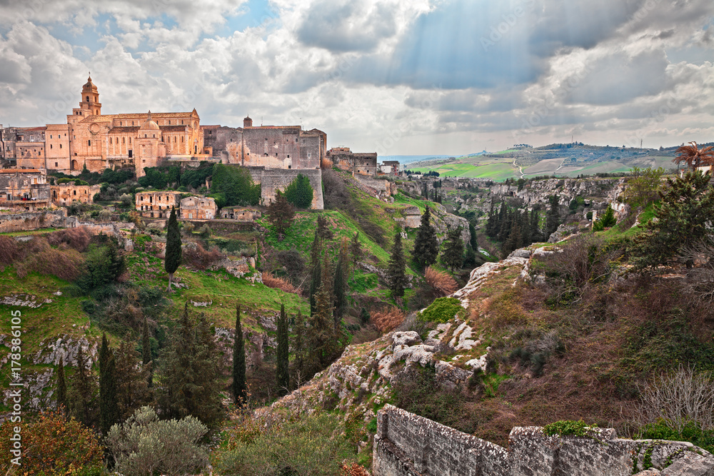 Gravina in Puglia, Bari, Italy: landscape of the the deep ravine and the old town with the ancient cathedral