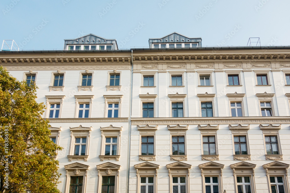 residential white facaded houses with clean sky residential white facaded houses with clean sky