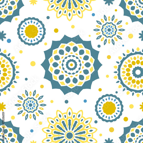 Seamless tiling texture with coloful mandalas and dots