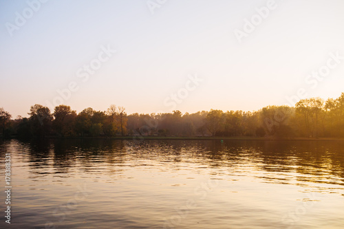 river in autumn with trees in the background