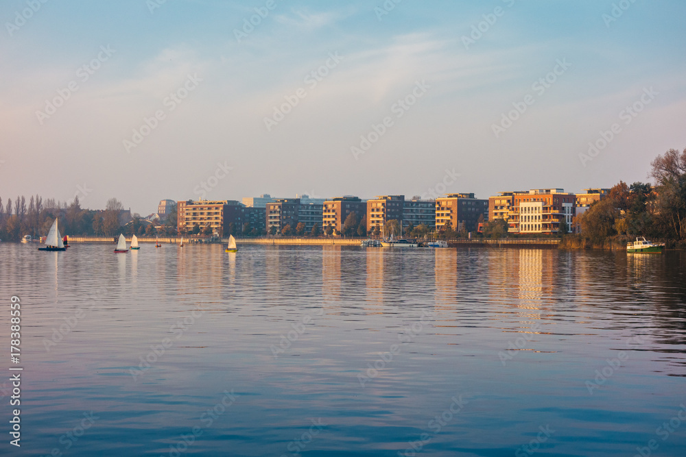 apartment buildings at spree river in the eve