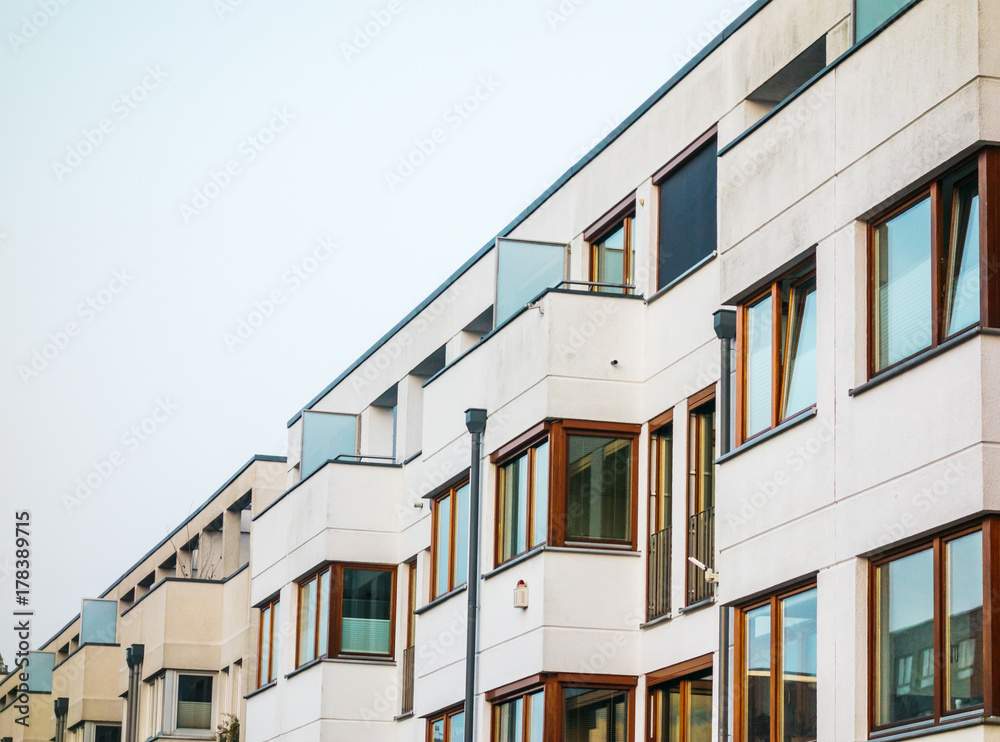 detailed view of modern white buildings in a row