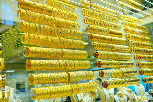 show-window with a set of pieces of jewelry from gold, precious jewelry